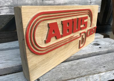 Abus D Cast CI-Firmenlogo aus Holz gefräst
