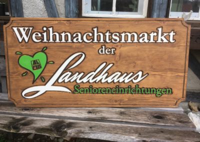 Werbeschild Firmenschild Holzschild Weihnachtsmarkt Landhaus Senioren kontur farbig